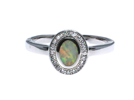 A Opal And White Cubic Zirconia Silver Ring
