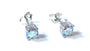 Kids Opalescent Cubic Zirconia Silver 5 mm Claw Set Earring.