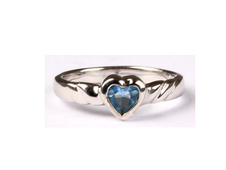 A Kids Aqua Cz Silver Heart Shaped Ring.