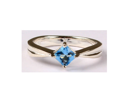 A Kids Aqua Cz Silver Ring.