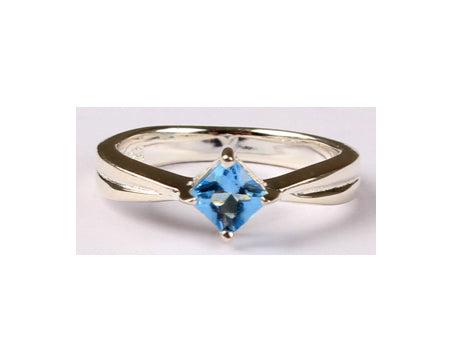 A Kids Aqua Cz Silver Ring.