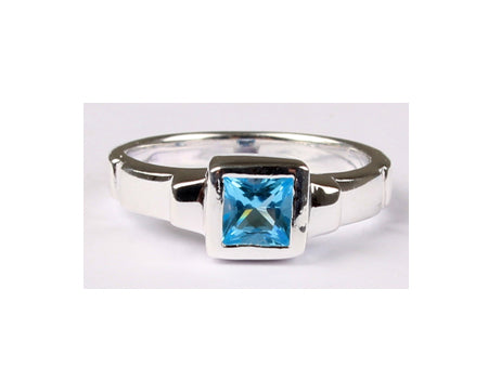 A Kids Aqua Cz Silver Ring.
