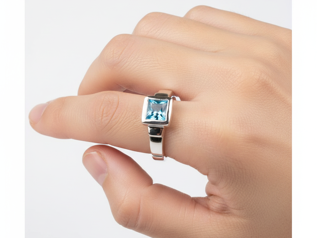 A Kids Aqua Cz Silver Ring.