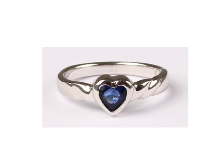 A Kids Sapphire Cz Silver Heart Shaped Ring.