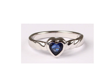 A Kids Sapphire Cz Silver Heart Shaped Ring.