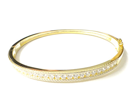 A White Cubic Zirconia Yellow plated Silver Bangle.