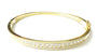 A White Cubic Zirconia Yellow plated Silver Bangle.