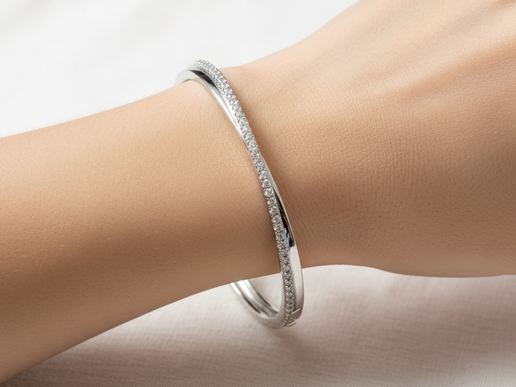 A White Cubic Zirconia Silver Bangle.