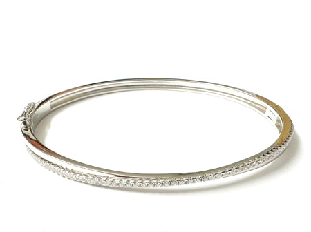 A White Cubic Zirconia Silver Bangle.