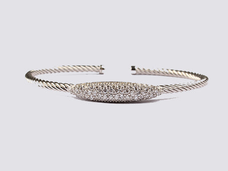 A White Cubic Zirconia Bangle.