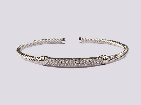 A White Cubic Zirconia Bangle.