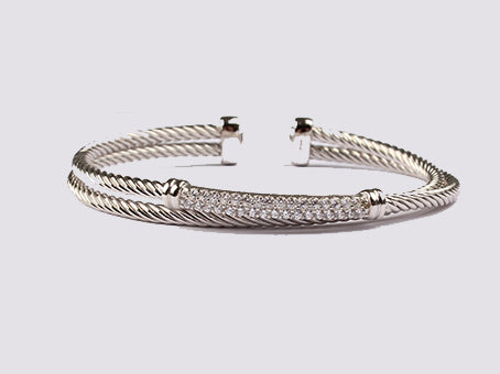 A White Cubic Zirconia Bangle.