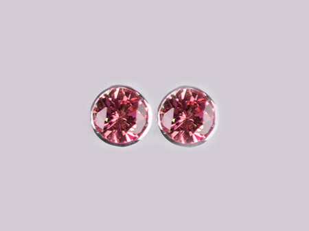 A Pink Cubic Zirconia Earring.