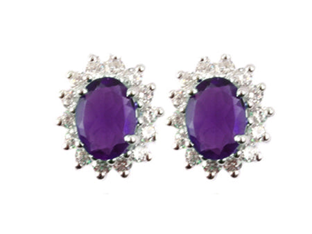 9 CT White Gold Earring.