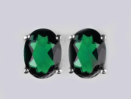A Emerald & White Cubic Zirconia Earring.