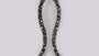 A Black & White Cubic Zirconia Earring.