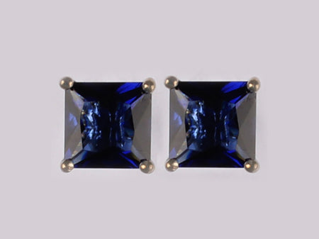 A Sapphire & White Cubic Zirconia Earring.