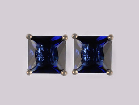 A Sapphire & White Cubic Zirconia Earring.