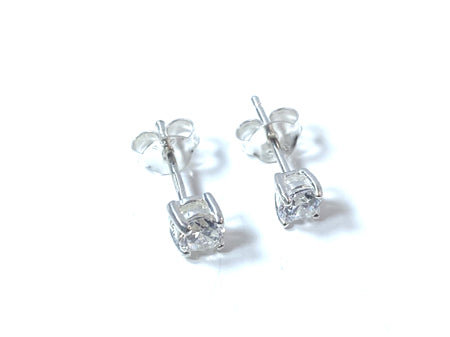 Kids White Cubic Zirconia Silver 4 mm Claw Set Earring.