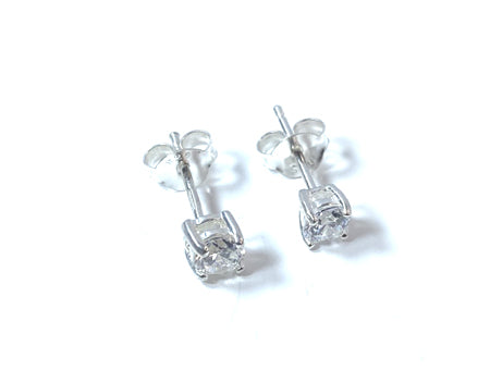 Kids White Cubic Zirconia Silver 4 mm Claw Set Earring.
