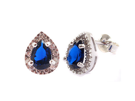A Sapphire & White Cubic Zirconia Pendant.