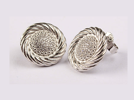 A White Cubic Zirconia Earring.