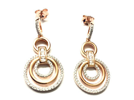 A Silver With Rose Gold Plate Earring.
