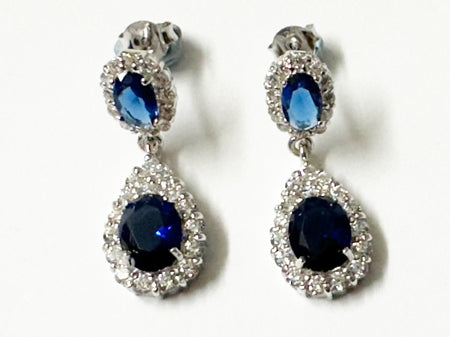 A Sapphire & White Cubic Zirconia Silver Earring.