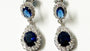 A Sapphire & White Cubic Zirconia Silver Earring.