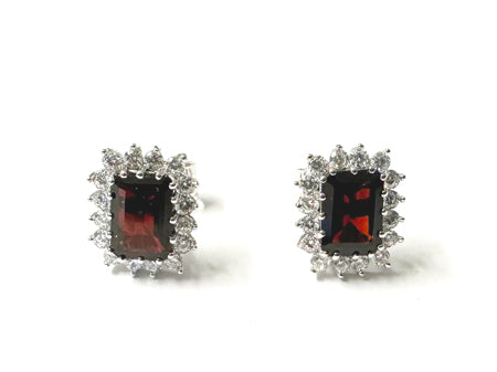9 CT White Gold Garnet Earring.