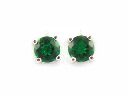 A Emerald & White Cubic Zirconia Earring.