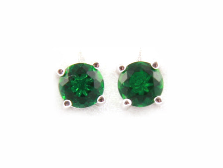 A Emerald & White Cubic Zirconia Earring.