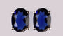 A Sapphire & White Cubic Zirconia Earring.