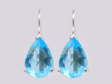 A Aquamarine & White Cubic Zirconia Earring.