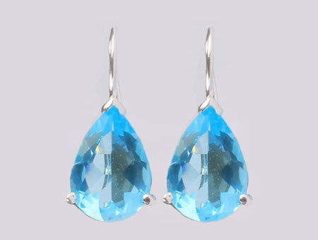 A Aquamarine & White Cubic Zirconia Earring.