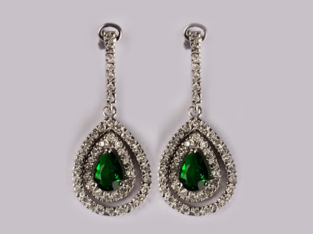 A Emerald & White Cubic Zirconia Earring.