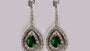 A Emerald & White Cubic Zirconia Earring.