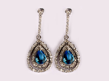 A Aquamarine & White Cubic Zirconia Earring.