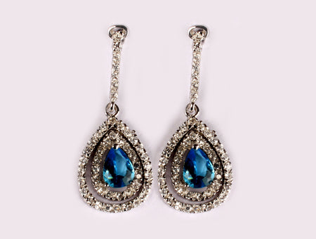 A Aquamarine & White Cubic Zirconia Earring.