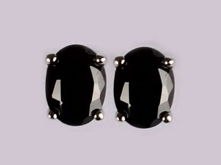A Black & White Cubic Zirconia Earring.