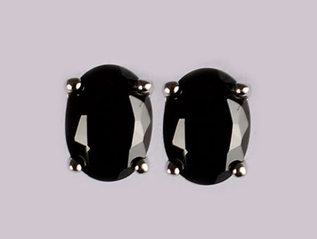 A Black & White Cubic Zirconia Earring.