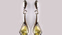 A Peridot & White Cubic Zirconia Earring.