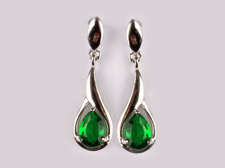 A Emerald & White Cubic Zirconia Earring.
