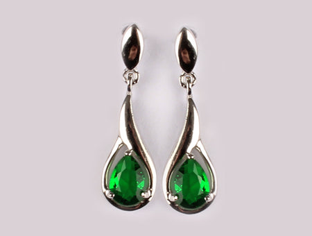 A Emerald & White Cubic Zirconia Earring.