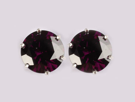A Amethyst & White Cubic Zirconia Earring.