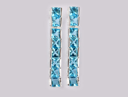 A Aquamarine & White Cubic Zirconia Earring.