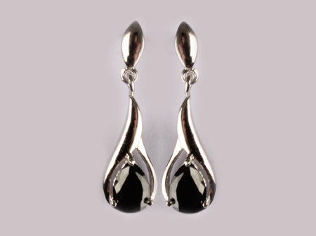 A Black & White Cubic Zirconia Earring.