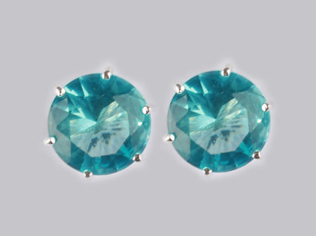 A Aquamarine & White Cubic Zirconia Earring.