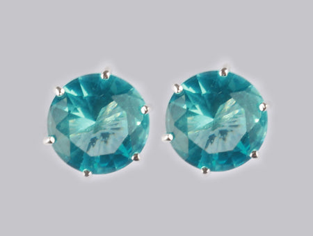 A Aquamarine & White Cubic Zirconia Earring.
