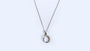 A White Cubic Zirconia Necklace.